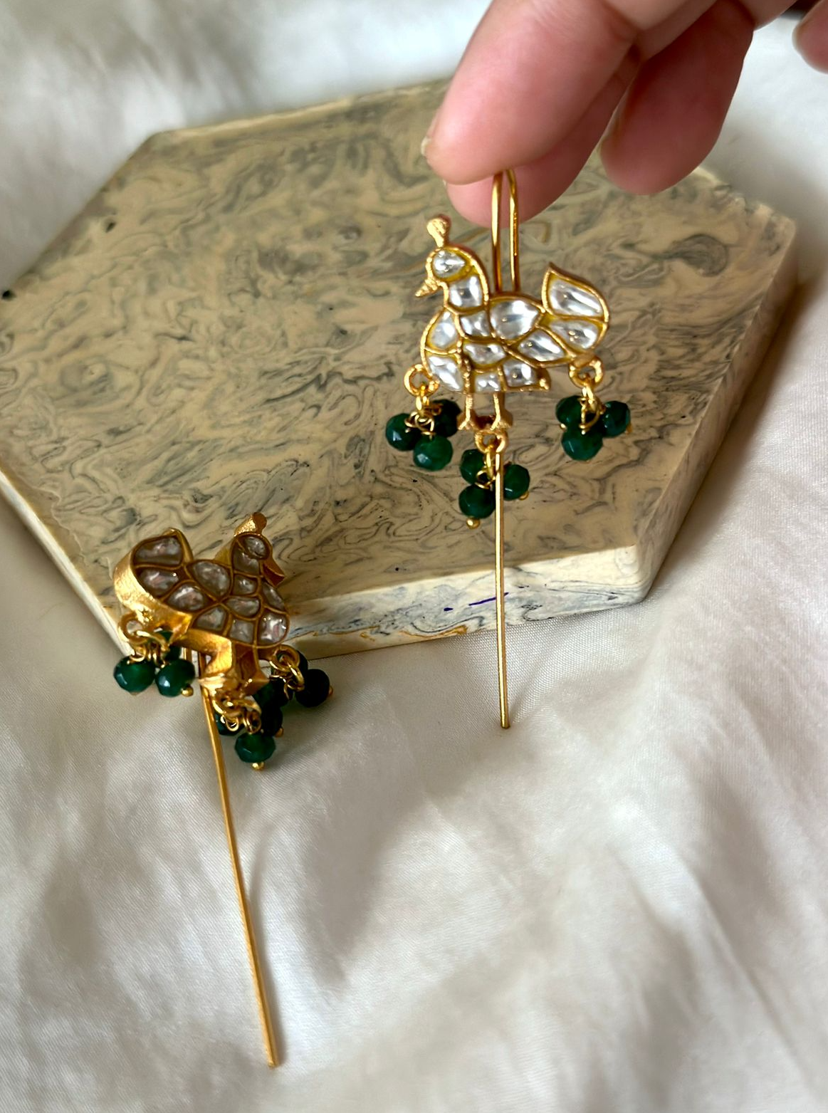 Twig earrings with peacock