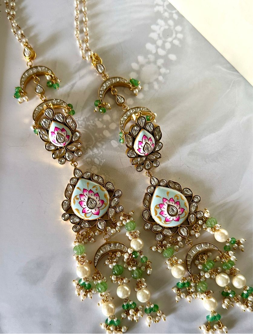 Meenakari kundan long earrings.