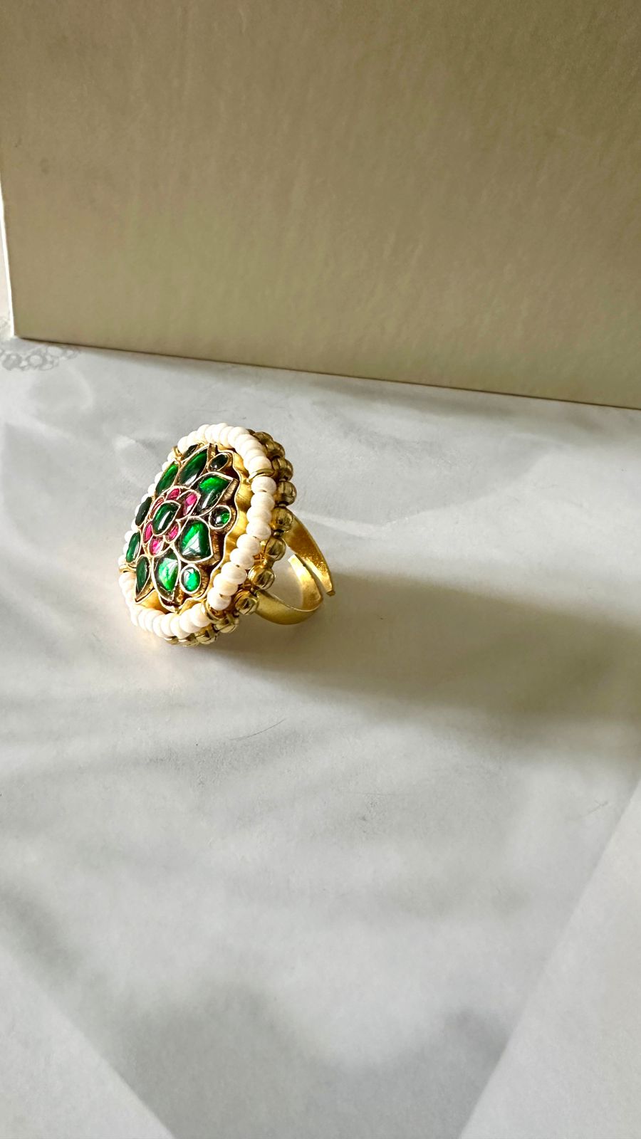 Kundan ring with green stones