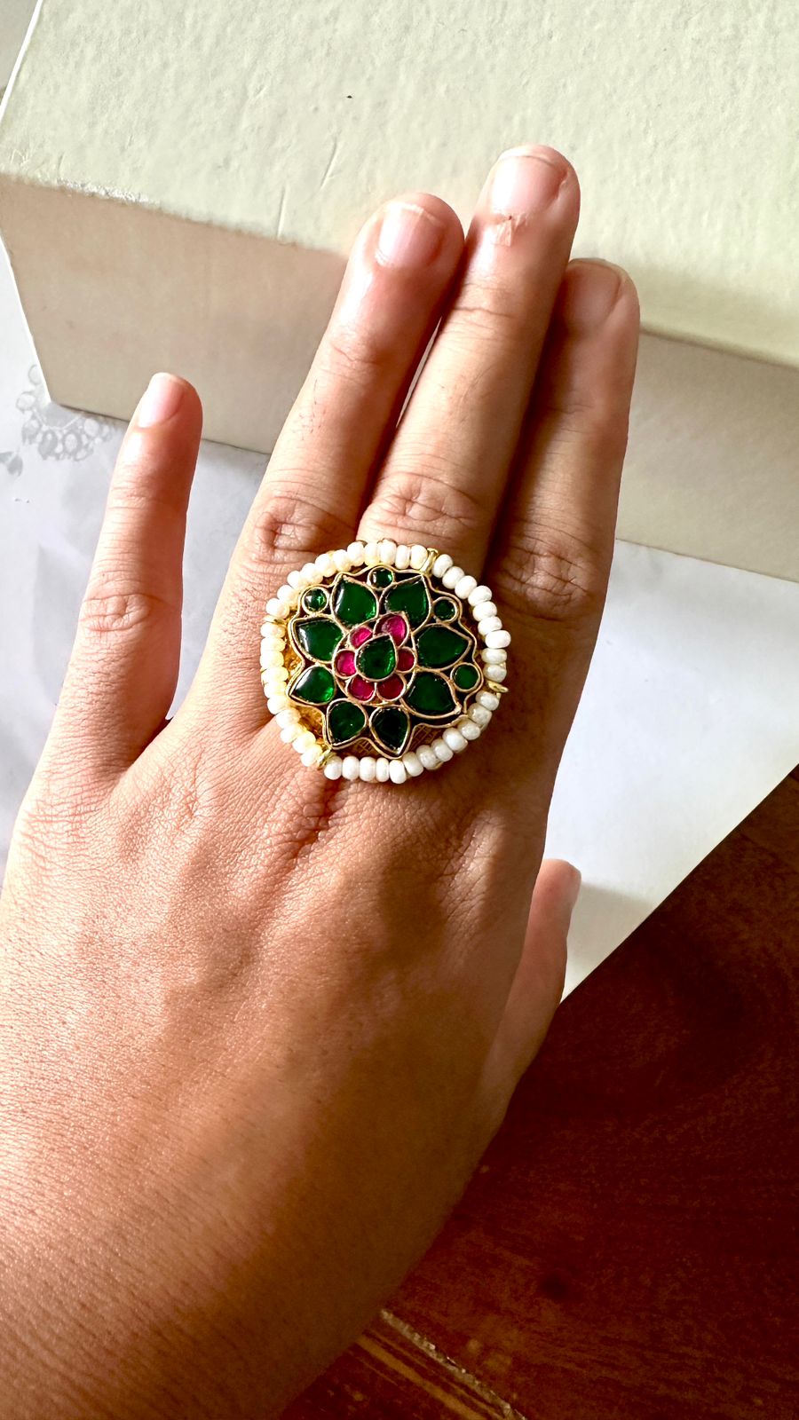 Kundan ring with green stones