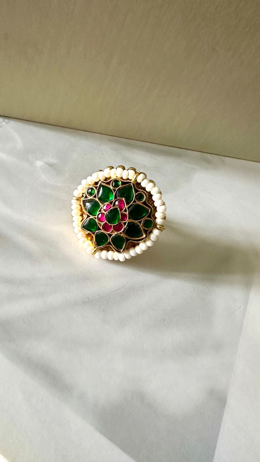 Kundan ring with green stones