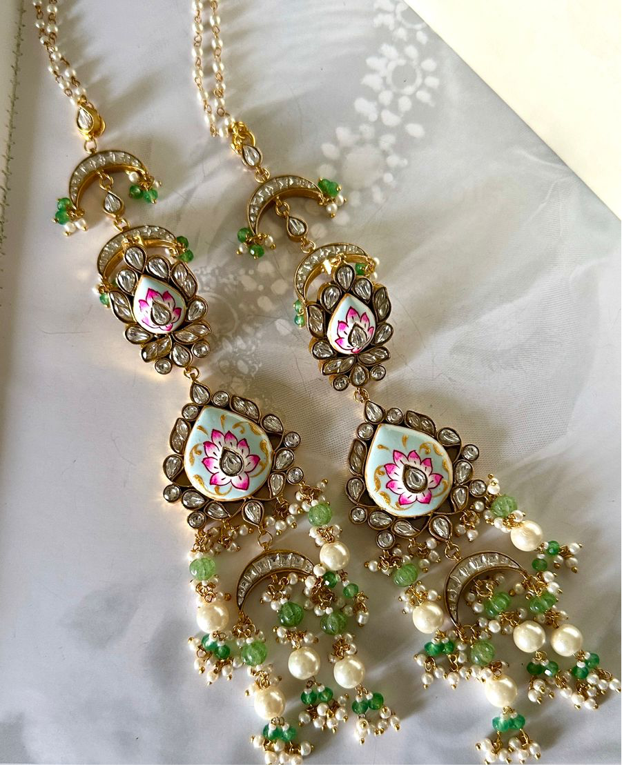 Meenakari kundan long earrings.