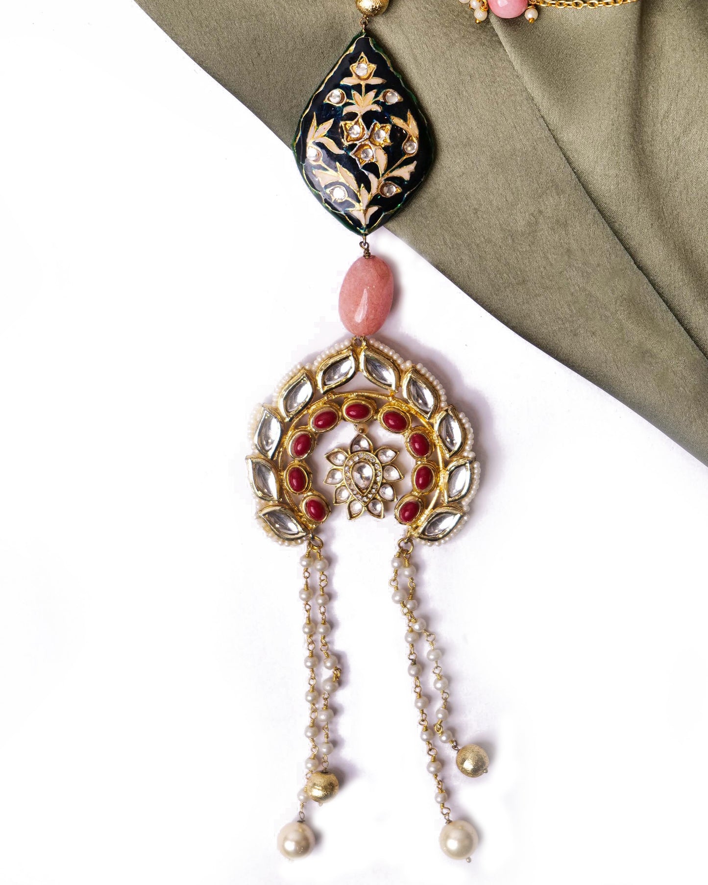 Long chain necklace with kundan and red stones