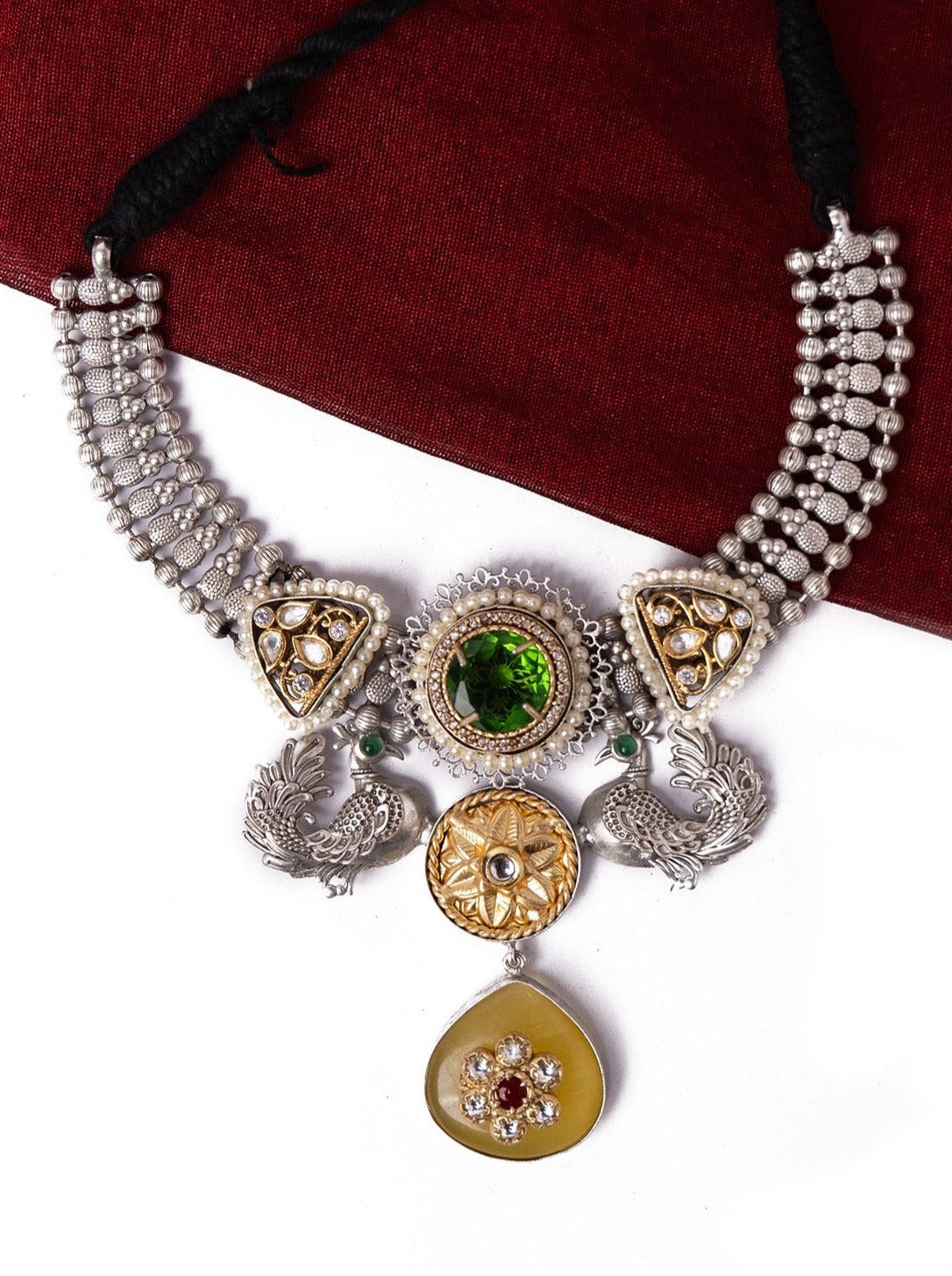 Choker with stones and peacock motifs